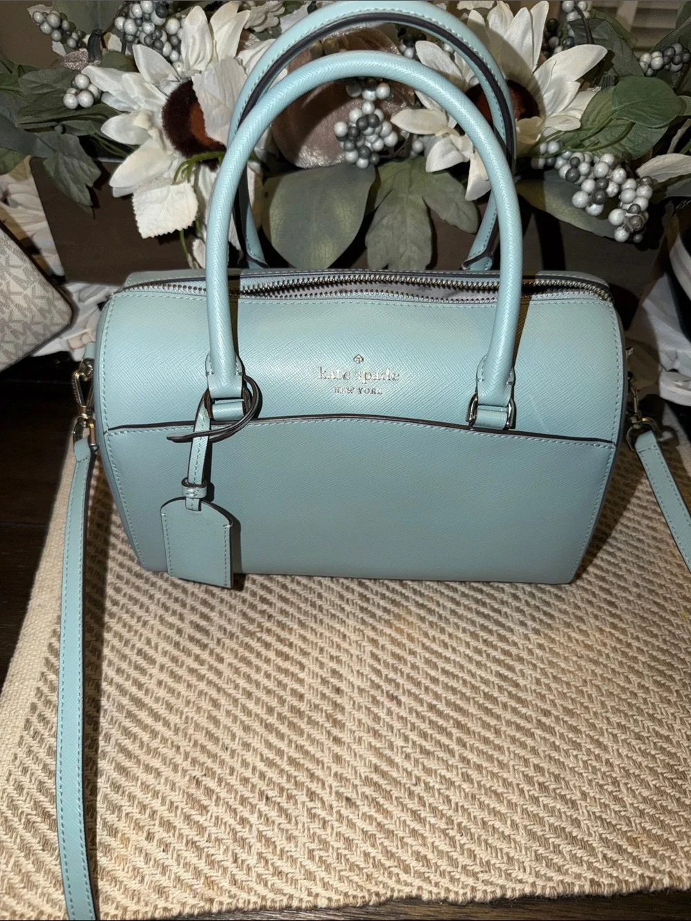 Kate Spade Devyn Medium Duffel Bag in the color Frosted Spearmint, featuring